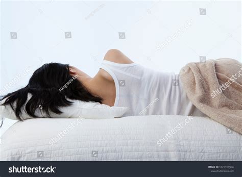 Woman Lying On Bed Bedroom Shutterstock