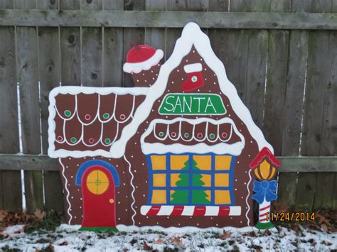 We are going to use some dollar tree gingerbread houses. Christmas Santa's Gingerbread House Wood Outdoor Village