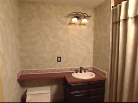 To create acrylic glazes on a wall, mix the acrylic paint with an acrylic medium golden glazing liquid. Paint Technique: Sandstone Finish Instructions | HGTV