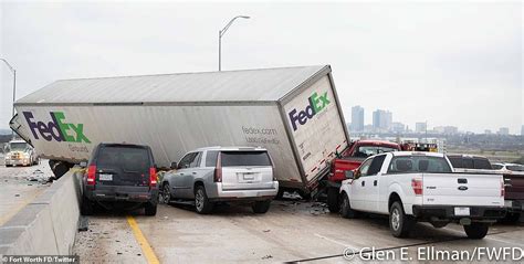 A view from a tv helicopter shows the 70 car & truck pile up. 'Multiple injuries' and people trapped in cars after 100 vehicle pile-up on a Texas freeway ...