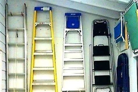 How To Hang A Ladder In The Garage Ladder Storage Ladder Wall