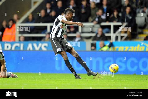 newcastle s sammy ameobi takes a shot which deflects of team mate