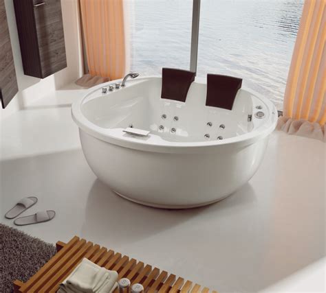 This whirlpool tub is the real definition of style, luxury, and comfort. Hs-b1574 Double Round Whirlpool Tub/ Freestanding ...