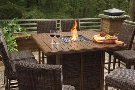 Paradise Trail Bar Table With Fire Pit Ashley Furniture Homestore