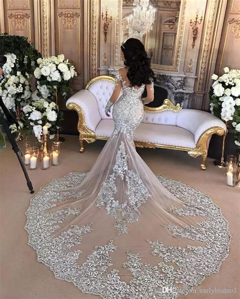 Dubai Arabic Luxury Sparkly 2020 Wedding Dresses Sexy Bling Beaded Lace Applique High Neck
