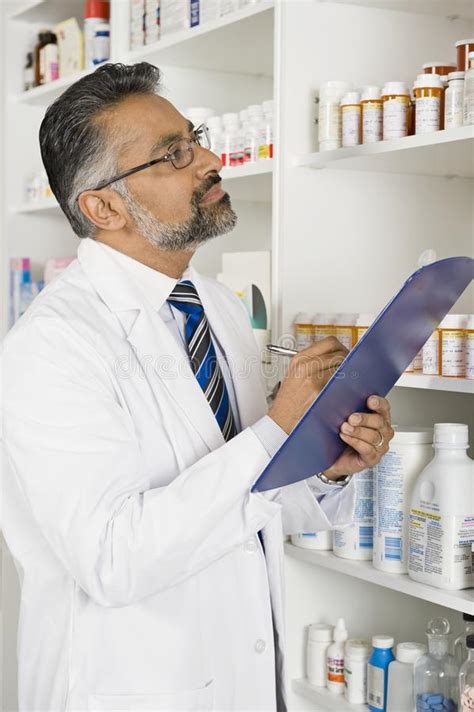 Male Pharmacist Working In Pharmacy Stock Image Image Of Pharmacist