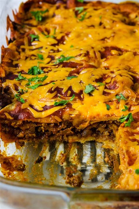 Layer with 3 more tortillas and remaining beans and chicken mixture. Layered Chicken Enchilada Casserole With Corn Tortillas ...
