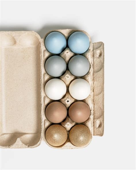 Premium Photo Colorful Easter Eggs In Carton Packing Blue Beige Neutral Colors Festive Chicken