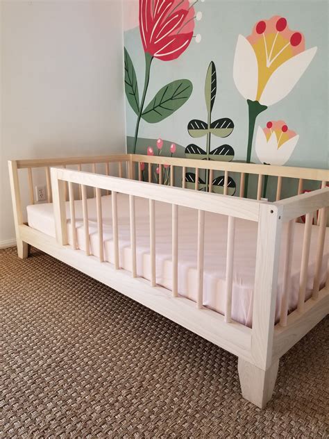 Super easy, really affordable, and it takes. Montessori Floor Bed to Raised Bed Convertible With Rails ...