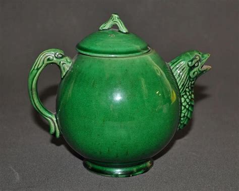 chinese green glaze teapot with bird head spout and figural handle ceramics chinese oriental