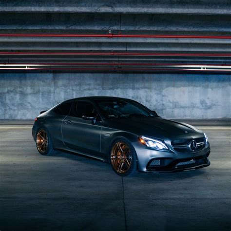 Full detail of a black car. Custom Mercedes C Class | Images, Mods, Photos, Upgrades — CARiD.com Gallery