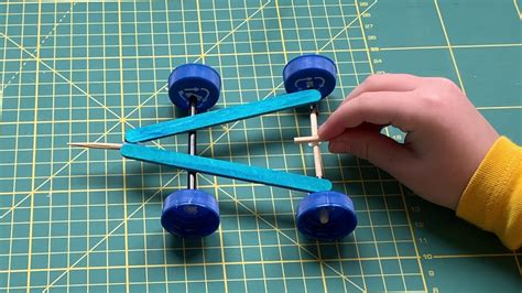 How To Make A Mini Rubber Band Car Easily Popsicle Stick Car Youtube