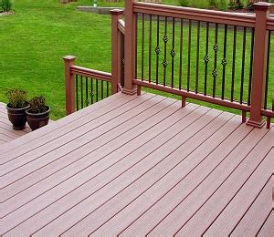 Aerating, seeding and fertilizing a lawn. Saskatoon Decks and Fences|We-Do-All Contractors