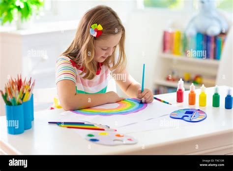 Kids Paint Child Painting In White Sunny Study Room Little Girl