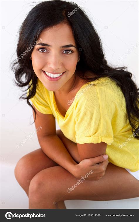 Young Beautiful Hispanic Woman Smiling Stock Photo By ©pixelheadphoto