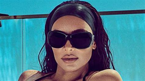 kim kardashian nearly busts out of a teeny leather skims bikini as two hot men grab her bare