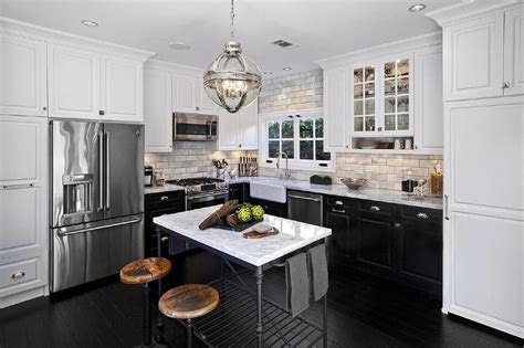 In this kitchen, the kelly green lowers and white uppers look right as rain. White Upper Cabinets and Black Bottom Cabinets with French ...