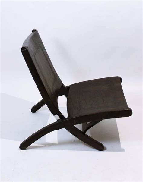 Check out our mid century dining chairs selection for the very best in unique or custom, handmade pieces from our dining chairs shops. Mid-Century Modern Tooled Leather Folding Lounge Chair ...
