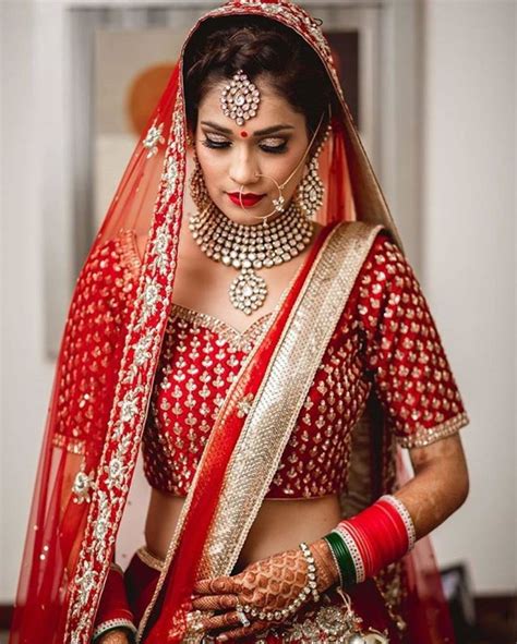 48 stylish wedding hairstyle ideas for indian bride with images bridal lehenga red stylish