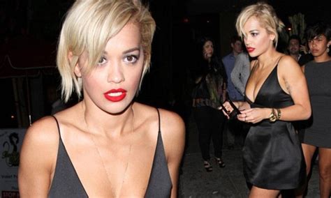 Rita Ora Shows Off Cleavage After Split From Calvin Harris Daily Mail Online