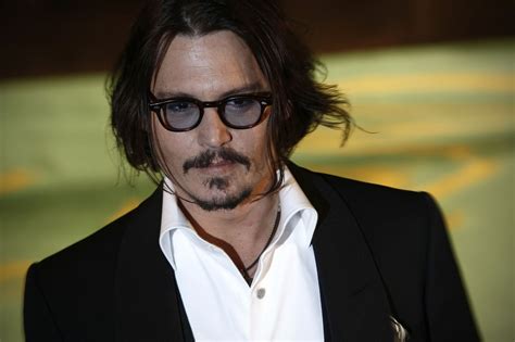 The actress, 35, took to instagram to share a snap of herself. Johnny Depp changes Amber Heard's knuckle tattoo to 'SCUM'