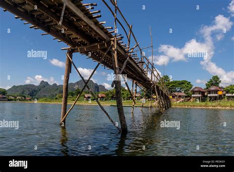 Bamboo Bridge On The Nam Song River In Vang Vieng Laos Stock Photo Alamy