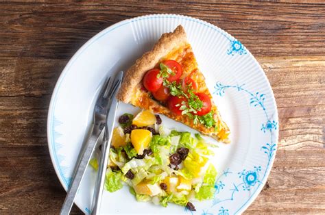 A syrian spinach and cheese pie comes together. Vegetarian quiche with cottage cheese, cherry tomatoes and ...