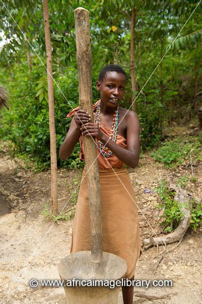 Photos And Pictures Of Kikuyu Woman Playing Music Ngomongo Village