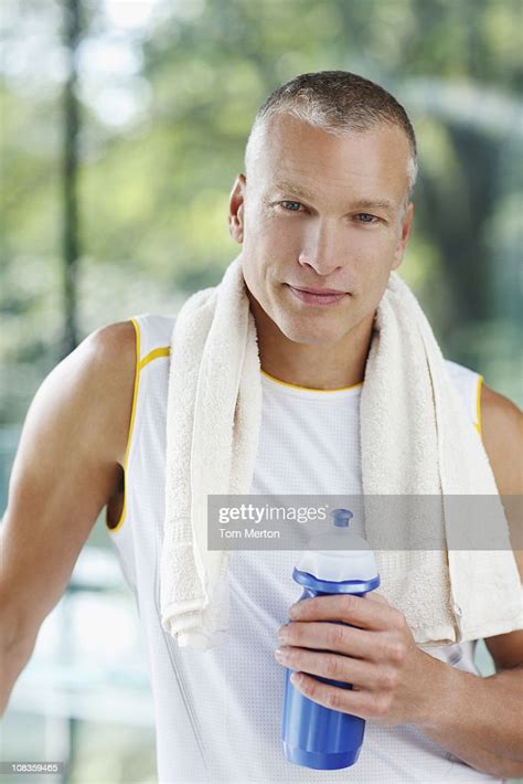 Man Drinking Water After Exercise High Res Stock Photo Getty Images