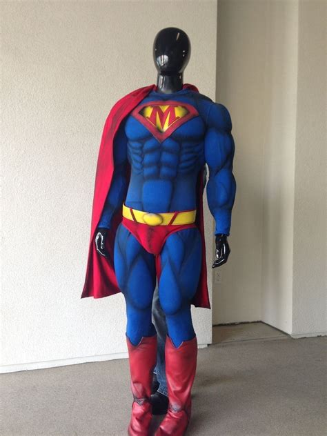 Happy woman in superhero costume laughs on gray background. Hand Crafted Super Hero Costume by LUCKY13 design+build ...