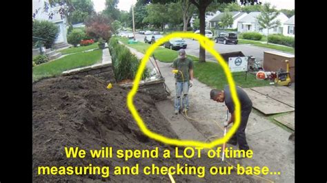 The first course starts halfway down from the top of the stone. How to Build a Retaining Wall, Minneapolis (Time Lapse ...