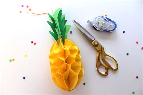 To make the pineapple leaves, print out the downloadable template; Pineapple Party DIY: How to Make a 3D Honeycomb Pineapple