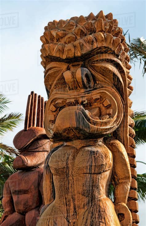 Hawaii Oahu Large Wooden Tiki Statues Greet Visitors Outside Of The Polynesian Cultural Center