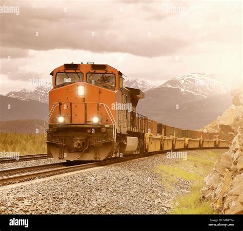 Long Freight Train Moves Through Canadian Rockies Stock Photo Alamy