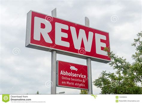 Commercial Sign Of Rewe Store At Cloudy Day Editorial Stock Image