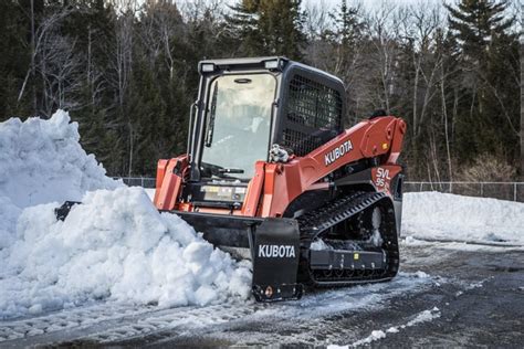 Tracks In The Snow Properly Equipped Compact Track Loaders Can Excel