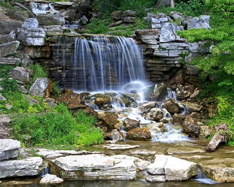 The local authorities have made a great effort to make the place accessable to all. Waterfall in Forest Park stock photo. Image of ripples ...