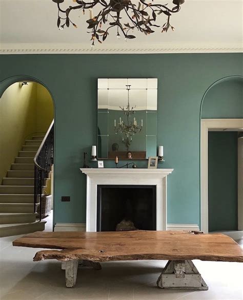Stunning Blue Green Room With Live Edge Table Next To A Yellowolive