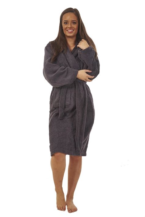 Clever placement of buttons and buttonholes make towel and sarong wrapping fun and easy—no more wrapping, tucking, or tying. Ladies 100% Pure Cotton Towelling Hooded Dressing Gown ...