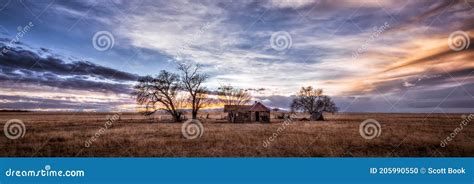 Old Farmhouse At Sunset In A Rural Setting Stock Photo Image Of