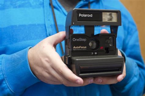 How To Change Batteries On The Polaroid 600 Onestep Express Techwalla