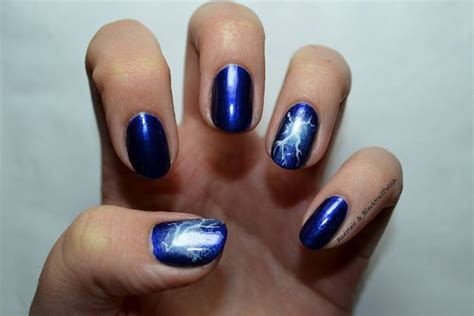A cool, yellow lightning bolt with black outlines. Blog not found | Hunger games nails, Nail art games, Nails