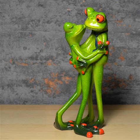 Comical Frogs Couple Kissing
