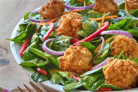 Add enough chicken strips to cover the bottom of the pan. Spinach and Fried Chicken Salad - BRIANNAS Salad Dressings