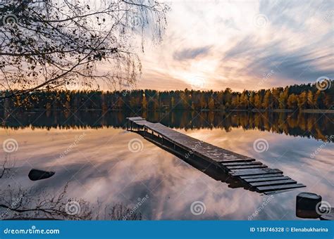 Autumn Foliage And Forest Lake With Wooden Dock Stock Photo Image Of
