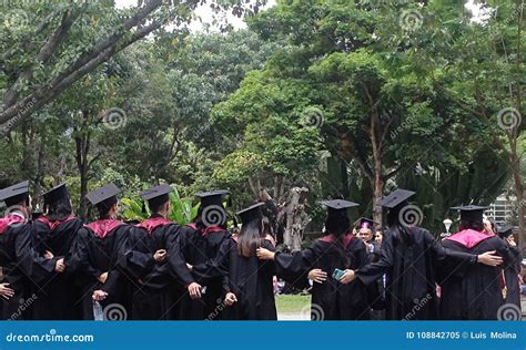 A Group Of A Young People Graduating From College Editorial Image
