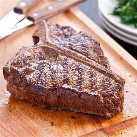 You don't have to sacrifice juiciness to make a. Grilled T-Bone Steaks with Lemon-Garlic Spinach | Cook's Country
