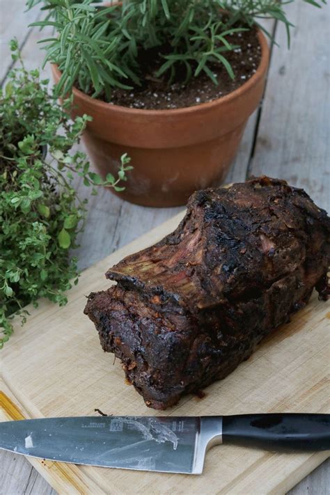 Rub spices on pork roast generously. French Bone-In Pork Shoulder Roast — Under A Tin Roof ...