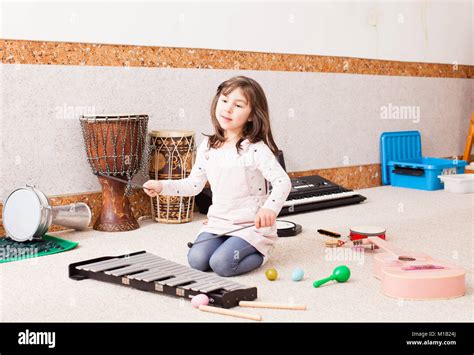 Cute Girl Playing On The Xylophone Stock Photo Alamy