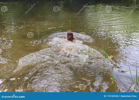 Brunette Swims In The Pond Girl Swims In The River Stock Photo Image